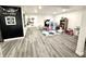 Spacious basement with plenty of room for play and activities on hard surface flooring at 8755 Stoddard Ln, Indianapolis, IN 46217