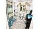 Modern bathroom with a vessel sink, elegant decor, walk in shower, and decorative hardware at 8755 Stoddard Ln, Indianapolis, IN 46217