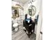 Stylish bathroom with vessel sink, decorative mirrors, unique tiling, and modern fixtures at 8755 Stoddard Ln, Indianapolis, IN 46217