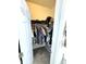 Walk-in closet with ample storage space for clothes, shoes, and accessories at 8755 Stoddard Ln, Indianapolis, IN 46217