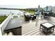 Spacious deck with outdoor seating and a lake view, perfect for relaxation at 8755 Stoddard Ln, Indianapolis, IN 46217