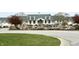 Beautiful building with manicured grounds and a circular driveway creating a welcoming approach at 8755 Stoddard Ln, Indianapolis, IN 46217