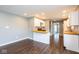 Bright kitchen featuring stainless steel appliances, white cabinets, and wood countertops at 905 E Yoke St, Indianapolis, IN 46203