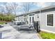 Elegant backyard patio featuring comfortable seating, a dining area, and well-maintained landscaping ideal for gatherings at 961 Starkey Rd, Zionsville, IN 46077