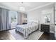 Serene bedroom with elegant décor, a large window, and stylish furnishings at 961 Starkey Rd, Zionsville, IN 46077
