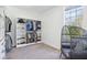 Bright walk-in closet featuring custom shelving, ample storage space, and a comfortable lounge chair at 961 Starkey Rd, Zionsville, IN 46077