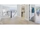 Hallway view featuring an open office space and access to a bright living area at 961 Starkey Rd, Zionsville, IN 46077