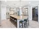 Spacious kitchen with a large center island, stainless steel appliances, and bright countertops, perfect for entertaining at 961 Starkey Rd, Zionsville, IN 46077