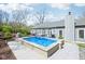 Inviting pool area with a crystal-clear pool, outdoor grill, and cozy patio offering a relaxing outdoor retreat at 961 Starkey Rd, Zionsville, IN 46077