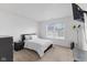 Well-lit bedroom features a neutral color scheme, carpeting, and a mounted TV at 9664 Trail Dr, Avon, IN 46123