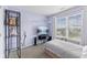 Bright bedroom features decor, a large window with blinds, and soft carpeting at 9664 Trail Dr, Avon, IN 46123