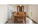 Cozy dining area showcasing a wood table and kitchen view at 9664 Trail Dr, Avon, IN 46123