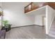 Spacious living room with wood floors, and plenty of natural light at 9664 Trail Dr, Avon, IN 46123