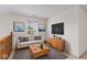 Bright living room features neutral decor, modern furnishings, and plenty of natural light at 9664 Trail Dr, Avon, IN 46123