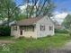 Charming single-story house featuring red shutters and a well-maintained lawn at 1105 N Livingston Ave, Indianapolis, IN 46222