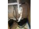 View of plumbing under a kitchen sink, showing drainage system at 1105 N Livingston Ave, Indianapolis, IN 46222