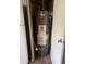 Utility closet housing the home's hot water heater at 1105 N Livingston Ave, Indianapolis, IN 46222