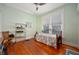 Cozy bedroom featuring a comfortable bed, and natural light, creating a peaceful retreat at 1217 Evison St, Indianapolis, IN 46203