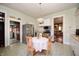 Bright kitchen featuring modern appliances, a dining area, and ample cabinet space at 1217 Evison St, Indianapolis, IN 46203