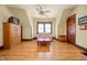 Cozy living room featuring hardwood floors, natural lighting, and a ceiling fan at 1217 Evison St, Indianapolis, IN 46203