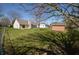 View of the backyard with a shed and deck at 12731 Slippery Rock Rd, Indianapolis, IN 46236
