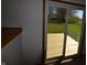 An outdoor deck area is shown through the sliding glass door with backyard views at 12731 Slippery Rock Rd, Indianapolis, IN 46236