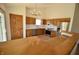 Bright kitchen featuring wood cabinets, stainless steel appliances, and tiled backsplash at 12731 Slippery Rock Rd, Indianapolis, IN 46236