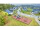 Aerial view of neighborhood featuring a playground and lush landscaping in a Gathering-friendly community at 12959 Girvan Way, Fishers, IN 46037