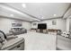 Finished basement area with gray couches, light gray walls, light gray carpet, and recessed lighting at 12959 Girvan Way, Fishers, IN 46037