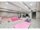 Spacious finished basement area with pink gym mats, light gray walls, light gray carpet and recessed lighting at 12959 Girvan Way, Fishers, IN 46037