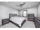 Gray bedroom with neutral decor, a ceiling fan, and lots of natural light at 12959 Girvan Way, Fishers, IN 46037