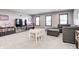 Bonus room featuring a large sectional, playroom table, and plenty of room to relax at 12959 Girvan Way, Fishers, IN 46037