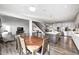 Dining room adjacent to an open concept kitchen and Gathering room for easy entertaining and casual living at 12959 Girvan Way, Fishers, IN 46037