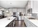 Bright and airy kitchen with stainless steel appliances, a large island, and plenty of counter space at 12959 Girvan Way, Fishers, IN 46037