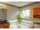 Bright bathroom with a jacuzzi bathtub and a large window at 1401 Runningbrook Ln, Avon, IN 46123