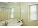 Bathroom featuring a long vanity with a marble countertop and a shower with glass doors at 1401 Runningbrook Ln, Avon, IN 46123