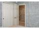 Bedroom featuring closet space and stairway access with a neutral-toned wall at 1401 Runningbrook Ln, Avon, IN 46123
