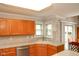 Bright kitchen with a stainless steel dishwasher, oven, and a breakfast bar at 1401 Runningbrook Ln, Avon, IN 46123