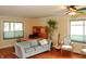 Comfortable living area with hardwood floors, a cozy sofa, and lots of natural light at 1401 Runningbrook Ln, Avon, IN 46123