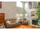 Comfortable living area featuring a fireplace, plush seating, and hardwood flooring at 1401 Runningbrook Ln, Avon, IN 46123