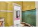 Unique kitchen with original wall tiles and plenty of storage at 1422 Olive St, Indianapolis, IN 46203
