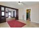Inviting living room featuring wood trim, neutral walls and open archways leading into other rooms at 1422 Olive St, Indianapolis, IN 46203