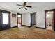 Open living space with connecting doorways and a view into a bathroom, ready for modern updates at 1422 Olive St, Indianapolis, IN 46203