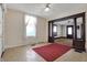 Cozy living room with vintage charm and hardwood floors throughout the space at 1422 Olive St, Indianapolis, IN 46203