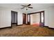 Expansive living room with decorative columns and ample space, awaiting modern updates and personal touches at 1422 Olive St, Indianapolis, IN 46203