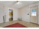 Sunlit living room featuring a view into the adjacent kitchen at 1422 Olive St, Indianapolis, IN 46203