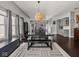 Spacious dining area seamlessly connects to a modern kitchen with stainless steel appliances at 1430 Fletcher Ave, Indianapolis, IN 46203