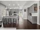 Modern kitchen with gray cabinets, stainless steel appliances, and a spacious breakfast bar at 1430 Fletcher Ave, Indianapolis, IN 46203