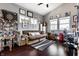 Cozy living room with hardwood floors, stylish decor, and bright natural light at 1430 Fletcher Ave, Indianapolis, IN 46203