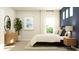 Comfortable bedroom with large windows, natural light, neutral tones, and elegant furniture at 15388 Manderley St, Fishers, IN 46040